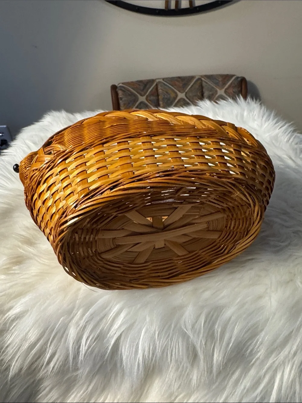 This vintage handwoven wicker and rattan swan-shaped basket.